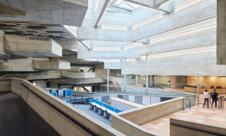 photo of concrete interior balconies and office floor of newly engineered UC Berkeley Art Museum